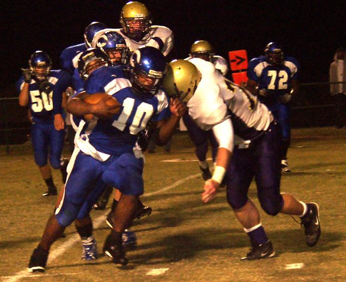 Chad Jordan and his TIGER teammates fight for yardage against Union City.