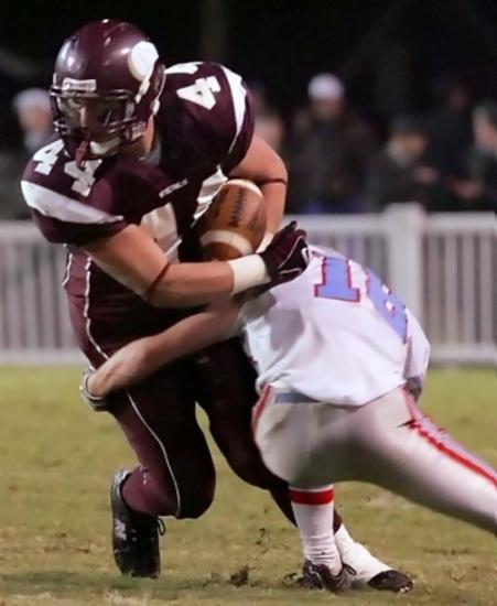 Matt Fickey (18) wraps up Tennessee High's Cory Strickland in game Friday.