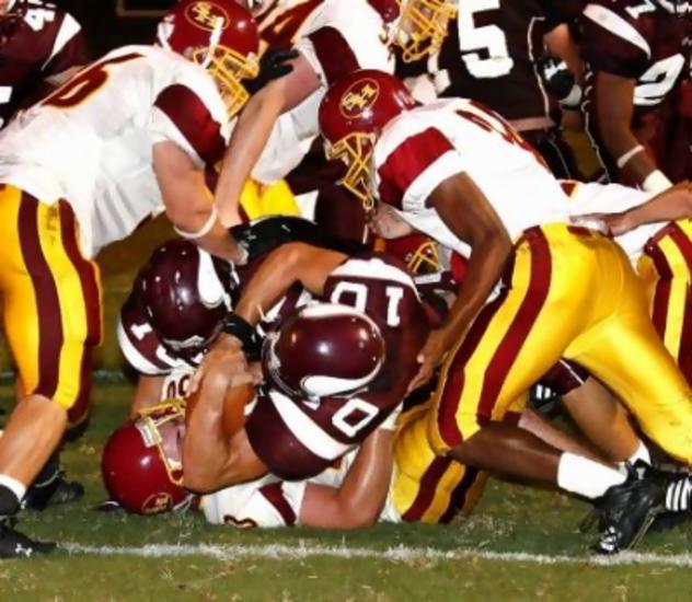 Tennessee High's Senior QB Danny Thomas bulls his way in for a touchdown from five yards out for the Viking's only score in the third Qtr.