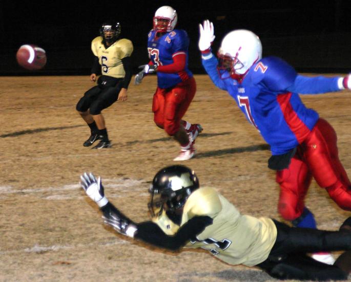 Millington wide out Kion Watson can't get to the pass.