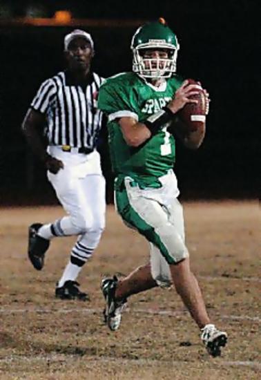 White Station QB Jeff Link rolls out for a pass