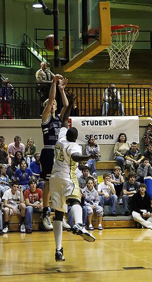 #10 Jonathan Lyons shots over Crocketts' #52