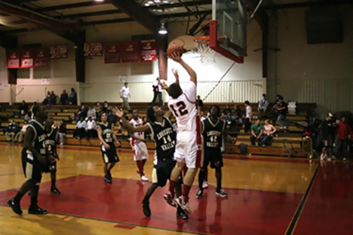 Josh Smith of  Temple going to the basket  against Lookout Valley