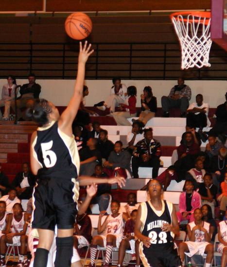 Ashley Robinson goes in for two of her 21 points.