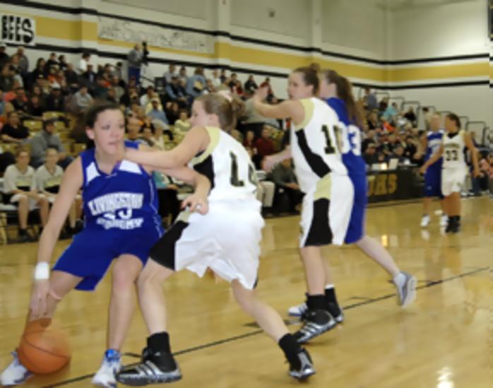 Mallie brings the ball inside.