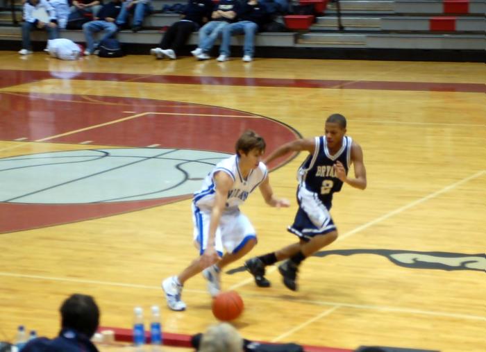 Harpeth's Cody Freeman works the ball upcourt