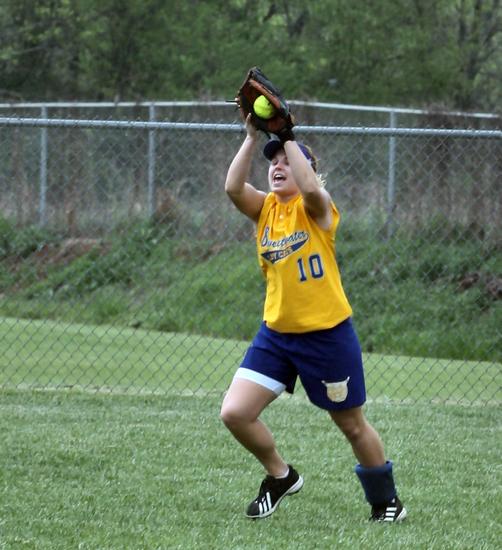 RF Heather Gibson hauls in a fly ball.