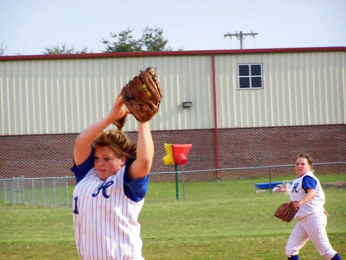 Pitcher Kayla Turner catches a pop fly for the third out