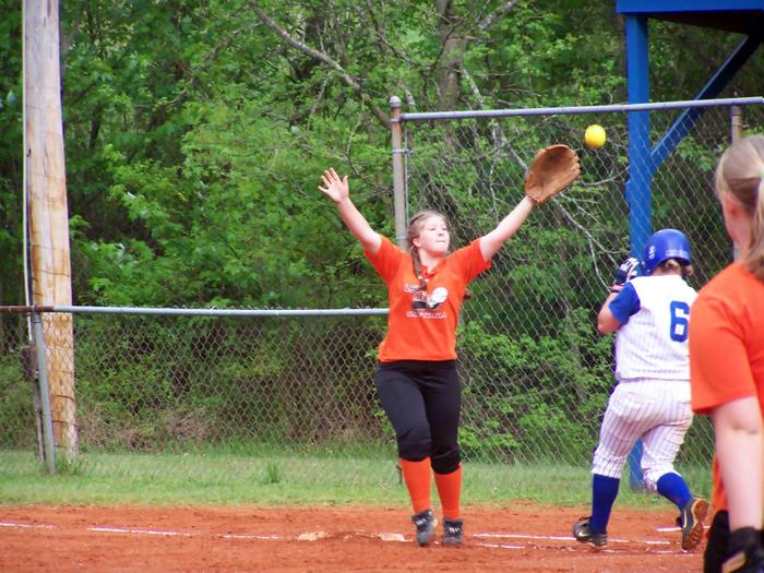 Nicole Hall makes it safely to First base