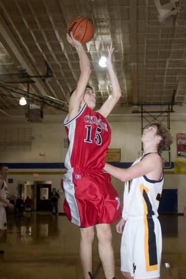 Josh Brown(15) goes up against the Camden defender