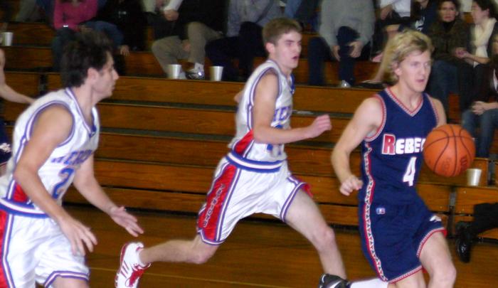 White makes a drive.