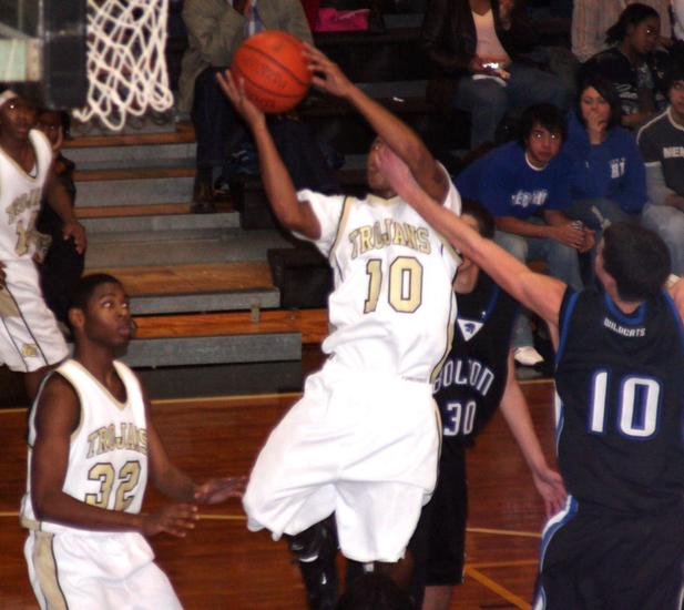 Trojan Trey Woods goes to the rim for two points.