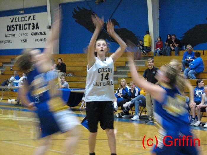 Megan Tinker warms up her shot in the JV game