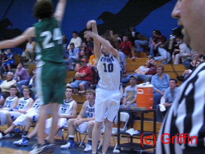 Brian Sneed connects from behind the arch