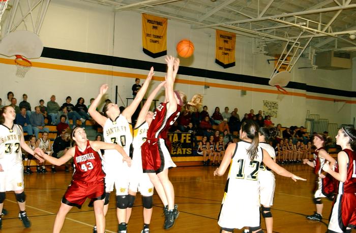 Lizzie Hewitt in a fight for a loose ball