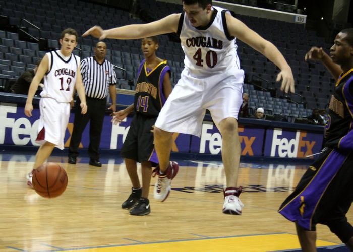 Owen has the ball slapped away.