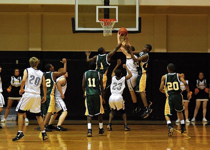Hendersonville grabs a rebound in first quarter play.
