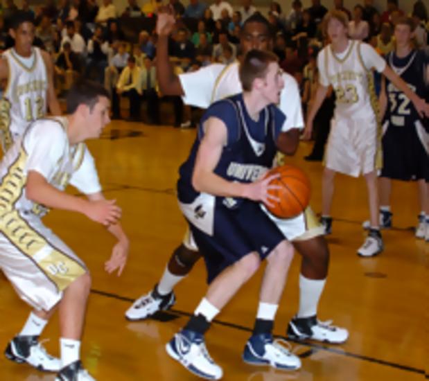 Bucs Senior Otha King goes up for a basket against Crockett.