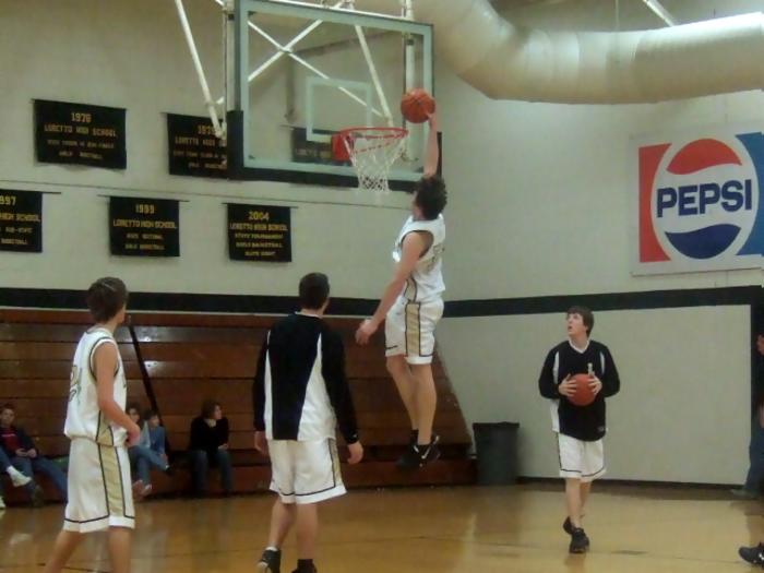 Clint Dunking in half time warm-ups