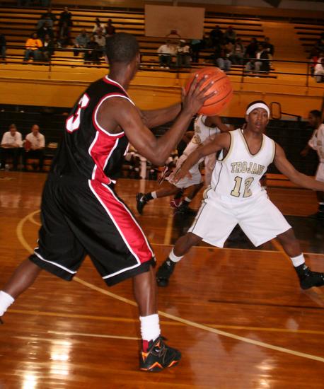 Ware guards Pharaoh Caleb Brown on the perimeter.